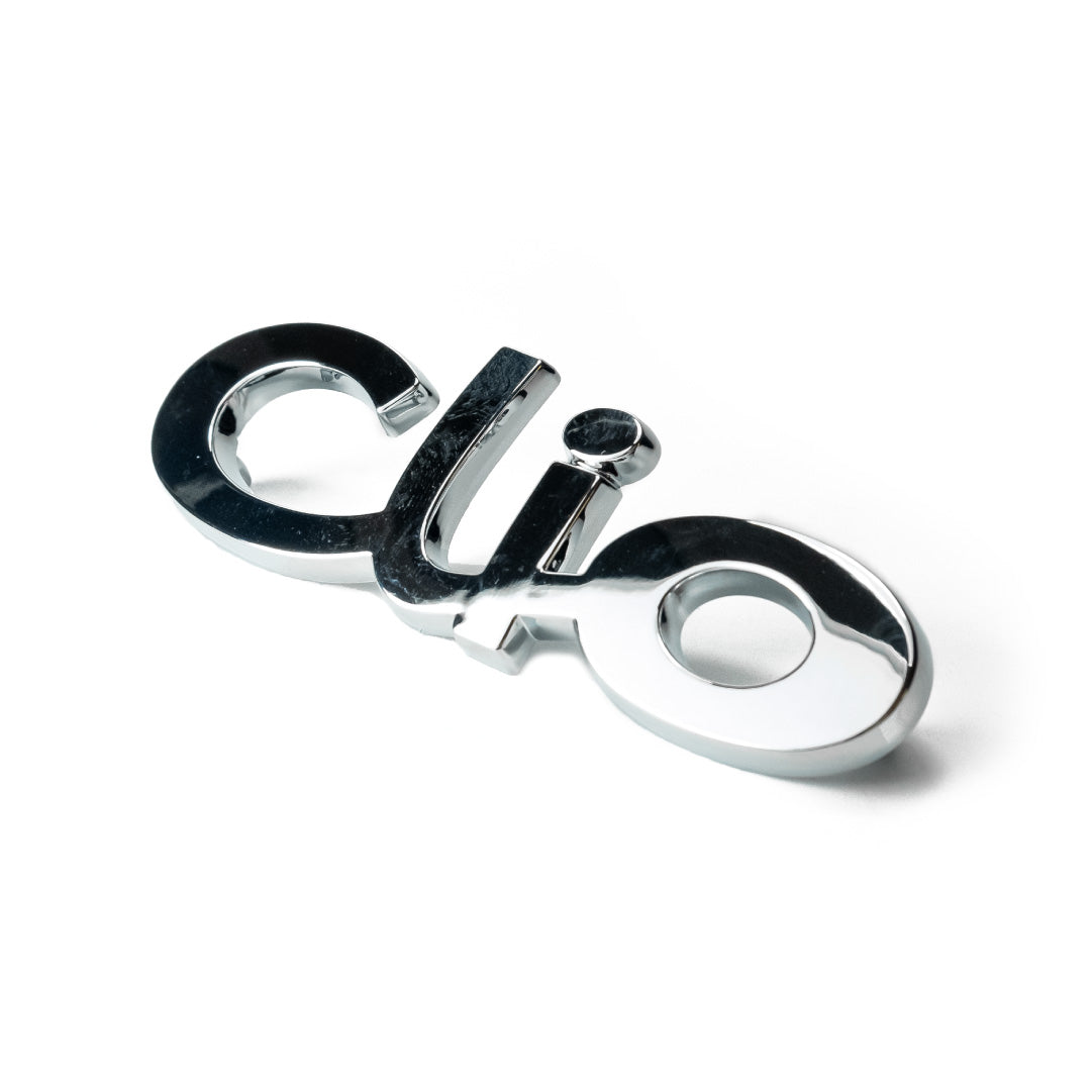 Genuine OEM Renault Clio Tailgate Trunk Boot Lid Badge Emblem Lettering Logo Monogram Chrome - Fits Clio II Sport 2001 172 182 - 7700849001